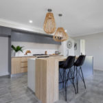 Wooden Table In Kitchen — Kitchen design in Paget, QLD