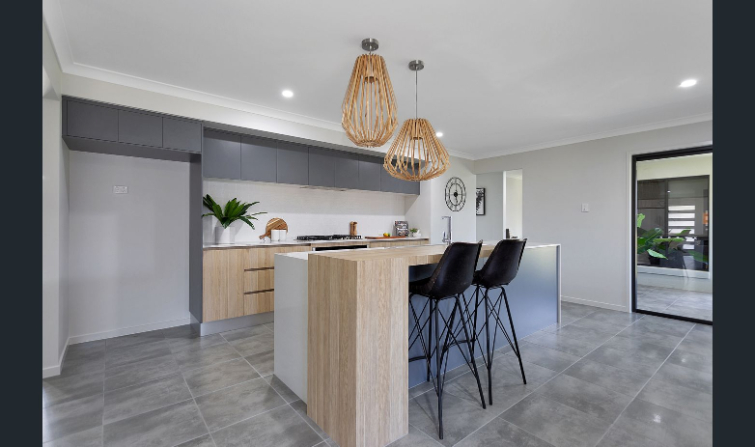 Wooden Table In Kitchen — Kitchen design in Paget, QLD