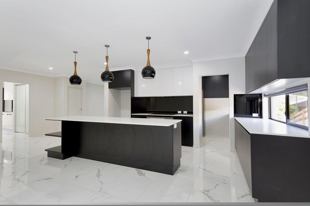 Black And White Table In Kitchen — Kitchen design in Paget, QLD