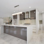 Brown And White Table In Kitchen — Kitchen design in Paget, QLD