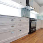 White Cabinet In Kitchen — Kitchen design in Paget, QLD