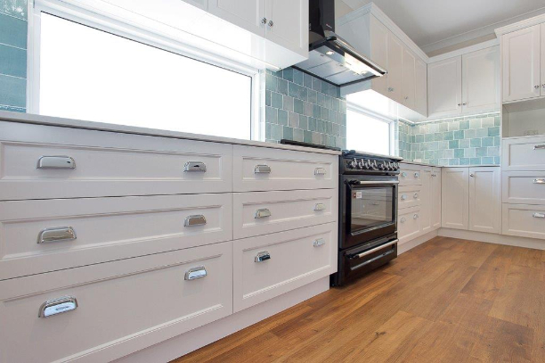 White Cabinet In Kitchen — Kitchen design in Paget, QLD